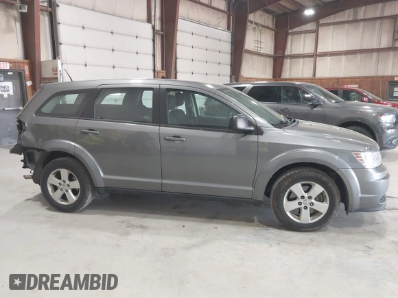 2013 Dodge Journey American Value with VIN 3C4PDCAB1DT508765, listed as a IAAI auction lot 42149373 with 159,113 mi miles and . Bid and sale history available at DreamBid. Image 13.