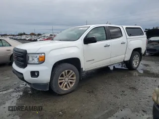 2016 GMC Canyon 4WD SLT with VIN 1GTP6DE11G1266217, listed as a Copart auction lot 82195694 with 129,578 mi miles and Clean Title. Bid and sale history available at carsss.com. Image 1.