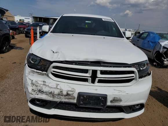 2014 Dodge Durango Limited with VIN 1C4RDJDG7EC599249, listed as a Copart auction lot 65560865 with 93,049 mi miles and Salvage title. Bid and sale history available at DreamBid. Image 5.