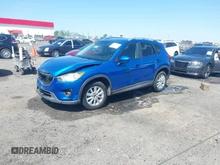 2013 Mazda CX-5 Touring with VIN JM3KE2CE4D0121155, listed as a IAAI auction lot 41983002 with 146,367 mi miles. Bid and sale history available at carsss.com. Image 18.