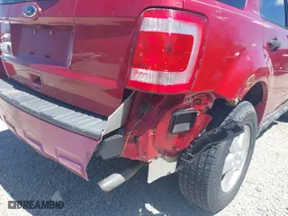2010 Ford Escape XLT with VIN 1FMCU0D75AKB11394, listed as a IAAI auction lot 42037996 with 150,815 mi miles. Bid and sale history available at carsss.com. Image 6.