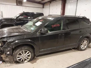 2013 Dodge Journey SXT with VIN 3C4PDDBGXDT571489, listed as a IAAI auction lot 42015939 with 206,550 mi miles and . Bid and sale history available at DreamBid. Image 14.