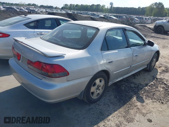 2001 Honda Accord EX z VIN 1HGCG16571A002293, wystawiony jako IAAI lot #42081307 z przebiegiem 336 808 mil mil oraz . Historia ofert i sprzedaży dostępna na DreamBid. Obrazek 4.