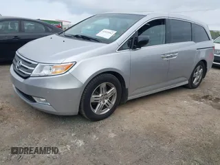 2012 Honda Odyssey Touring with VIN 5FNRL5H98CB026754, listed as a IAAI auction lot 41935562 with 165,626 mi miles. Bid and sale history available at carsss.com. Image 19.
