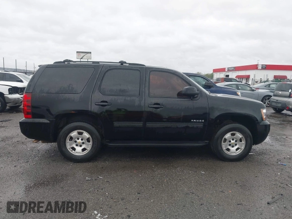 2013 Chevrolet Tahoe LS with VIN 1GNSCAE07DR223062, listed as a IAAI auction lot 41948276 with 196,616 mi miles and . Bid and sale history available at DreamBid. Image 13.