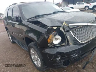 2008 GMC Yukon SLT 4SB z VIN 1GKFK13018J146391, wystawiony jako IAAI lot #42102852 z przebiegiem 305 880 mil mil oraz . Historia ofert i sprzedaży dostępna na DreamBid. Obrazek 13.
