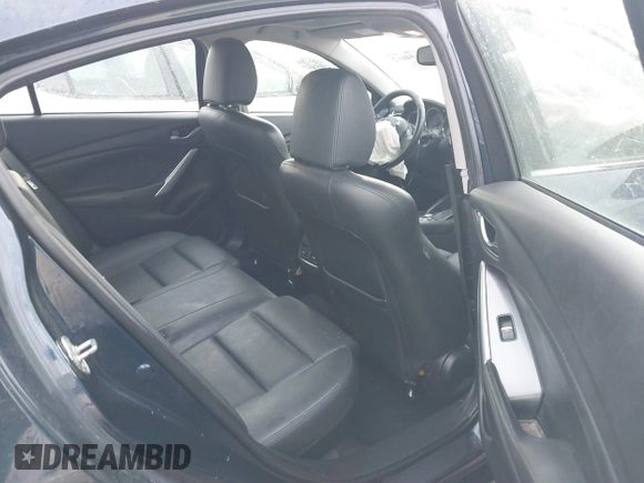 2016 Mazda Mazda6 i Touring with VIN JM1GJ1T54G1434497, listed as a IAAI auction lot 41654012 with 133,901 mi miles. Bid and sale history available at carsss.com. Image 8.