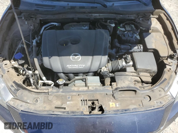 2015 Mazda 3 i Grand Touring z VIN 3MZBM1M72FM145070, wystawiony jako Copart lot #58419525 z przebiegiem 61 255 mil mil oraz Szkoda całkowita • Salvage title. Historia ofert i sprzedaży dostępna na DreamBid. Obrazek 11.