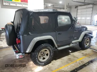 2001 Jeep Wrangler SE with VIN 1J4FA29P31P357744, listed as a Copart auction lot 45743275 with 188,045 mi miles and Salvage Title. Bid and sale history available at carsss.com. Image 3.