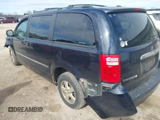 2010 Dodge Grand Caravan SXT with VIN 2D4RN5D13AR427353, listed as a IAAI auction lot 42180594 with 191,535 mi miles and . Bid and sale history available at DreamBid. Image 3.