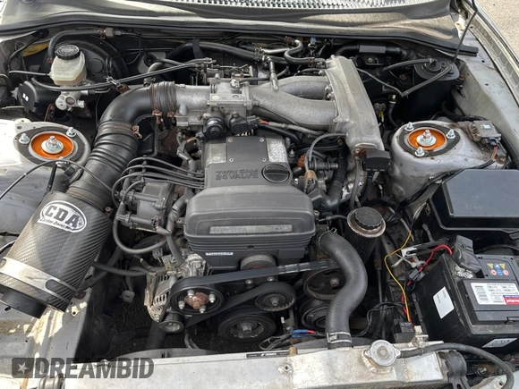 1993 Toyota Supra с VIN JZA800010229, выставлен на аукционе Copart как лот 50000065 с пробегом 130 612 миль миль и Чистый • Clean title. История ставок и продаж доступна на DreamBid. Изображение 7.