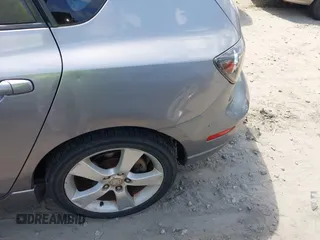 2005 Mazda 3 s with VIN JM1BK343151259901, listed as a IAAI auction lot 42028513 with 209,689 mi miles. Bid and sale history available at carsss.com. Image 6.