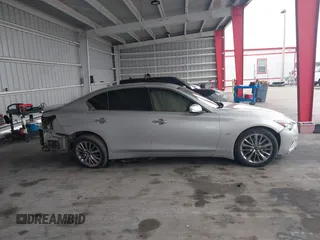 2020 Infiniti Q50 Luxe with VIN JN1EV7AP4LM206062, listed as a IAAI auction lot 41208388 with 64,621 mi miles and . Bid and sale history available at DreamBid. Image 14.