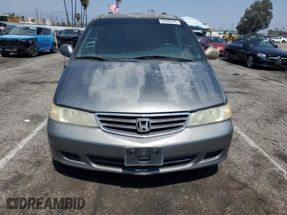2002 Honda Odyssey EX-L with VIN 2HKRL189X2H530814, listed as a Copart auction lot 62280465 with 270,080 mi miles and Salvage title. Bid and sale history available at DreamBid. Image 5.