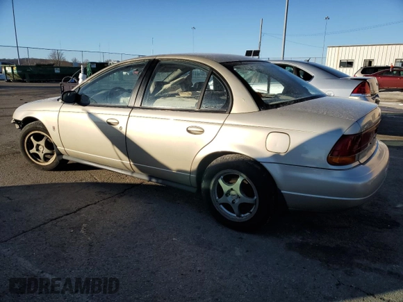 1999 Saturn SL z VIN 1G8ZK5272XZ163225, wystawiony jako Copart lot #41788725 z przebiegiem 144 999 mil mil oraz Szkoda całkowita • Salvage title. Historia ofert i sprzedaży dostępna na DreamBid. Obrazek 2.