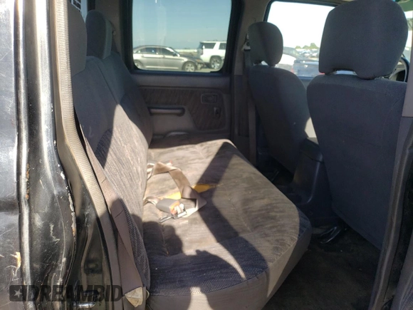 2000 Nissan Frontier XE z VIN 1N6ED27Y3YC324102, wystawiony jako Copart lot #56922155 z przebiegiem 202 233 mil mil oraz Szkoda całkowita • Salvage title. Historia ofert i sprzedaży dostępna na DreamBid. Obrazek 10.