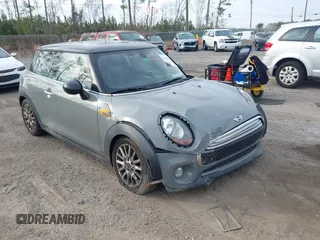 2015 MINI Hardtop with VIN WMWXM5C59F3A58798, listed as a IAAI auction lot 41514988 with 127,771 mi miles and . Bid and sale history available at DreamBid. Image 1.