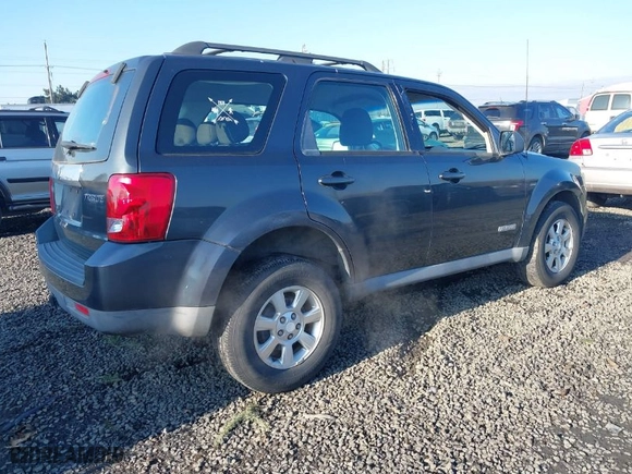 2008 Mazda Tribute Touring with VIN 4F2CZ96168KM05738, listed as a IAAI auction lot 41403675 with 217,593 mi miles. Bid and sale history available at carsss.com. Image 4.
