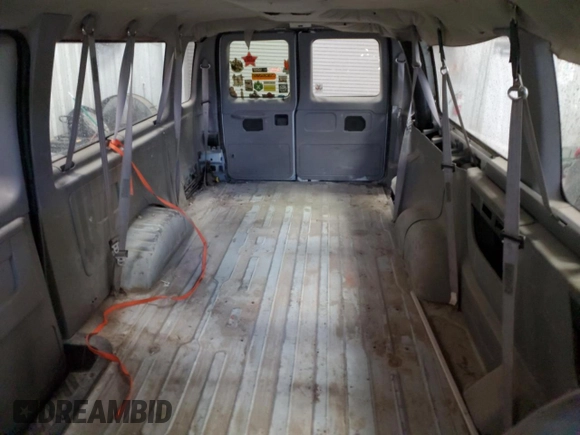 1998 Ford Econoline Wagon XL z VIN 1FBSS31L1WHA95941, wystawiony jako Copart lot #85722674 z przebiegiem 235 498 mil mil oraz Tytuł czysty. Historia ofert i sprzedaży dostępna na DreamBid. Obrazek 10.