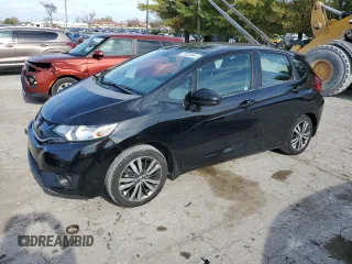 2015 Honda Fit EX-L z VIN 3HGGK5H8XFM700714, wystawiony jako Copart lot #79183164 z przebiegiem 40 648 mil mil oraz Nie do naprawy. Historia ofert i sprzedaży dostępna na DreamBid. Obrazek 1.