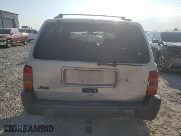 1998 Jeep Grand Cherokee Laredo with VIN 1J4GZ58S8WC301754, listed as a Copart auction lot 69698144 with 205,739 mi miles and Non Repairable. Bid and sale history available at carsss.com. Image 6.
