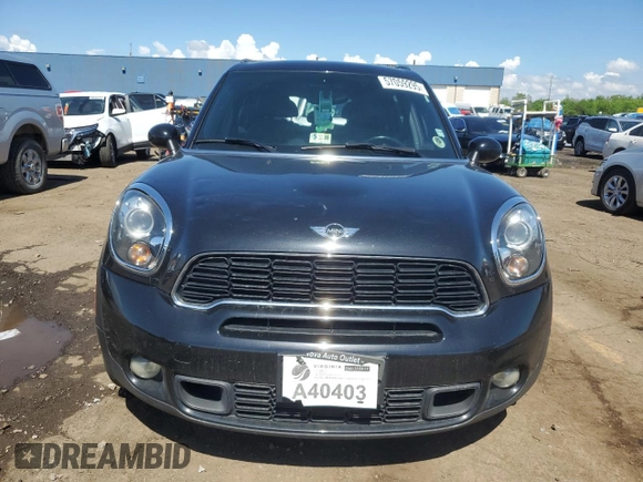2013 MINI Countryman S ALL4 z VIN WMWZC5C54DWP34353, wystawiony jako Copart lot #57059295 z przebiegiem 154 012 mil mil oraz Szkoda całkowita • Salvage title. Historia ofert i sprzedaży dostępna na DreamBid. Obrazek 5.