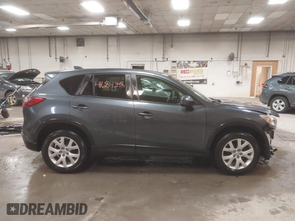 2013 Mazda CX-5 Touring with VIN JM3KE4CE4D0157892, listed as a IAAI auction lot 41684348 with 146,496 mi miles and . Bid and sale history available at DreamBid. Image 14.