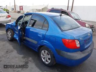 2008 Kia Rio LX with VIN KNADE123486365738, listed as a IAAI auction lot 41902367 with 248,194 mi miles. Bid and sale history available at carsss.com. Image 3.