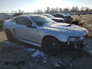 1999 Ford Mustang GT with VIN 1FAFP42X6XF159917, listed as a Copart auction lot 42371825 with 133,761 mi miles and Salvage Title. Bid and sale history available at carsss.com. Image 4.