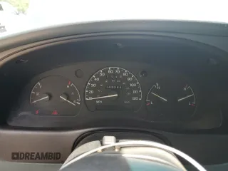 1997 Ford Ranger XLT z VIN 1FTCR10A1VUB21797, wystawiony jako Copart lot #59839605 z przebiegiem 145 266 mil mil oraz Szkoda całkowita • Salvage title. Historia ofert i sprzedaży dostępna na DreamBid. Obrazek 9.