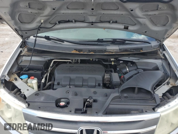 2012 Honda Odyssey EX z VIN 5FNRL5H48CB021249, wystawiony jako Copart lot #55952215 z przebiegiem 146 302 mil mil oraz Szkoda całkowita • Salvage title. Historia ofert i sprzedaży dostępna na DreamBid. Obrazek 12.