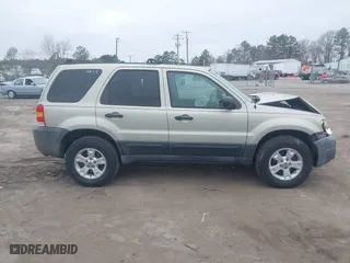 2005 Ford Escape XLT with VIN 1FMYU93135DA07844, listed as a IAAI auction lot 41786019 with 118,840 mi miles. Bid and sale history available at carsss.com. Image 13.