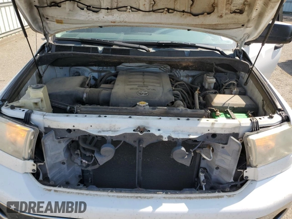 2013 Toyota Tundra z VIN 5TFDW5F11DX295393, wystawiony jako Copart lot #53049515 z przebiegiem 204 926 mil mil oraz Szkoda całkowita • Salvage title. Historia ofert i sprzedaży dostępna na DreamBid. Obrazek 11.