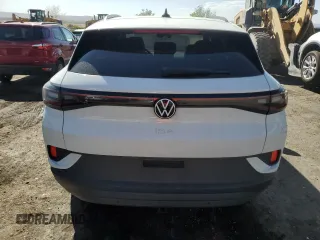2023 Volkswagen ID.4 Pro z VIN 1V2DNPE8XPC028695, wystawiony jako Copart lot #51606685 z przebiegiem 18 217 mil mil oraz Szkoda całkowita • Salvage title. Historia ofert i sprzedaży dostępna na DreamBid. Obrazek 6.