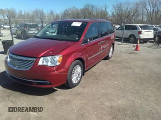 2014 Chrysler Town & Country Limited with VIN 2C4RC1GG5ER463952, listed as a IAAI auction lot 41825303 with 150,131 mi miles and . Bid and sale history available at DreamBid. Image 2.