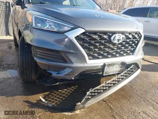 2019 Hyundai Tucson Value with VIN KM8J33A49KU860842, listed as a IAAI auction lot 41735224 with 57,197 mi miles. Bid and sale history available at carsss.com. Image 6.