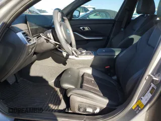 2023 BMW 3 Series 330e xDrive with VIN 3MW39FS07P8D00974, listed as a Copart auction lot 84912304 with 18,879 mi miles and Salvage Title. Bid and sale history available at carsss.com. Image 7.