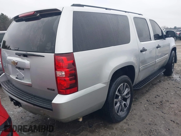 2010 Chevrolet Suburban LS with VIN 1GNUKHE37AR193670, listed as a IAAI auction lot 41415863 with 213,371 mi miles and . Bid and sale history available at DreamBid. Image 4.