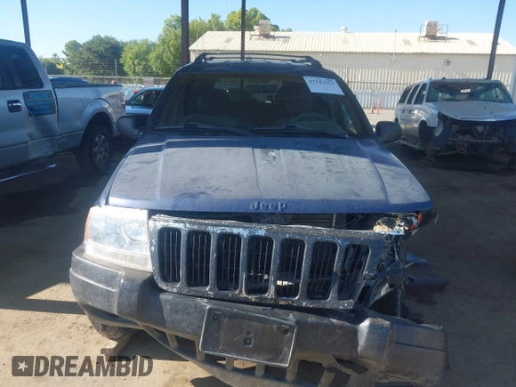2000 Jeep Grand Cherokee Laredo with VIN 1J4G248SXYC274865, listed as a IAAI auction lot 42542922 with 185,902 mi miles and . Bid and sale history available at DreamBid. Image 12.