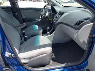 2015 Hyundai Accent GLS z VIN KMHCT4AE5FU820657, wystawiony jako IAAI lot #42506759 z przebiegiem 110 376 mil mil oraz . Historia ofert i sprzedaży dostępna na DreamBid. Obrazek 5.