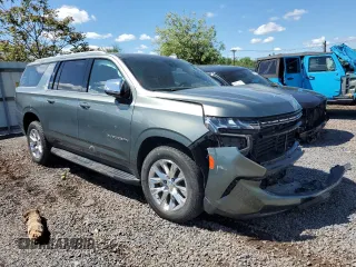 2023 Chevrolet Suburban Premier with VIN 1GNSKFKD0PR278738, listed as a Copart auction lot 56220235 with 58,718 mi miles and Non Repairable. Bid and sale history available at DreamBid. Image 4.