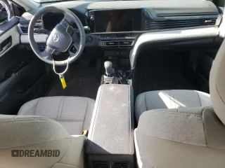 2025 Toyota Camry LE z VIN 4T1DAACK3SU570793, wystawiony jako Copart lot #55525395 z przebiegiem Nie podano mil oraz Szkoda całkowita • Salvage title. Historia ofert i sprzedaży dostępna na DreamBid. Obrazek 8.