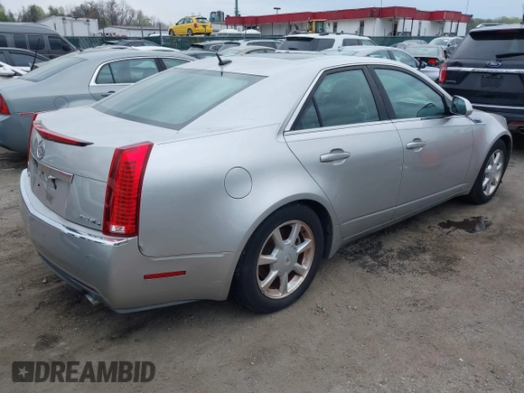 2008 Cadillac CTS AWD w/1SB with VIN 1G6DT57VX80174891, listed as a IAAI auction lot 39161303 with 116,089 mi miles. Bid and sale history available at carsss.com. Image 4.