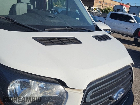 2019 Ford Transit z VIN 1FTYR2CG7KKA96911, wystawiony jako IAAI lot #42566551 z przebiegiem 207 807 mil mil oraz . Historia ofert i sprzedaży dostępna na DreamBid. Obrazek 24.