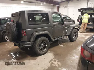 2018 Jeep Wrangler Sport S with VIN 1C4AJWAG2JL836246, listed as a IAAI auction lot 41661489 with 87,443 mi miles and . Bid and sale history available at DreamBid. Image 4.