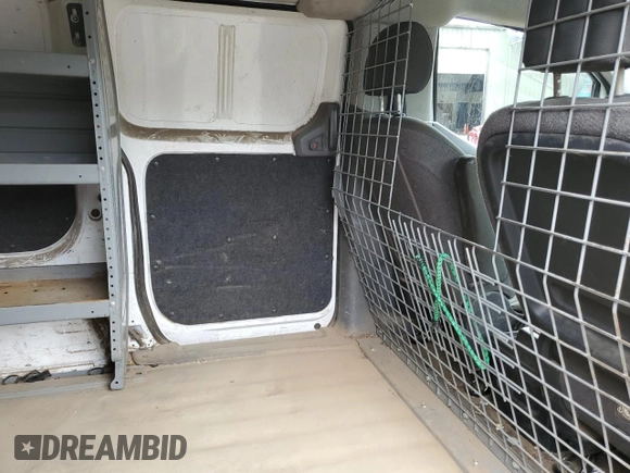 2015 Nissan NV200 SV with VIN 3N6CM0KN9FK708496, listed as a Copart auction lot 57135105 with 141,126 mi miles and Salvage title. Bid and sale history available at DreamBid. Image 11.