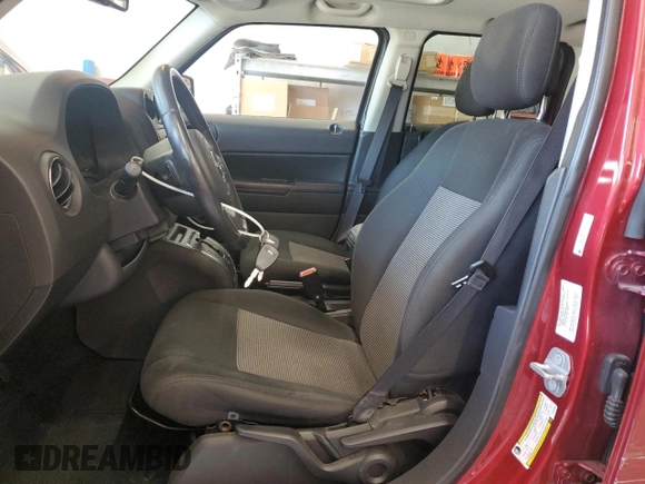 2014 Jeep Patriot Latitude with VIN 1C4NJRFB2ED734624, listed as a Copart auction lot 60675175 with 91,624 mi miles and Salvage title. Bid and sale history available at DreamBid. Image 7.