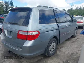 2006 Honda Odyssey EX-L z VIN 5FNRL38776B108949, wystawiony jako IAAI lot #42349613 z przebiegiem 206 240 mil mil oraz . Historia ofert i sprzedaży dostępna na DreamBid. Obrazek 4.