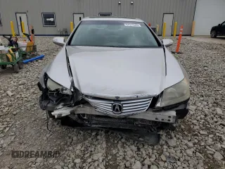 2005 Acura RL z VIN JH4KB16515C011475, wystawiony jako Copart lot #57517545 z przebiegiem 254 459 mil mil oraz Nie do naprawy. Historia ofert i sprzedaży dostępna na DreamBid. Obrazek 5.