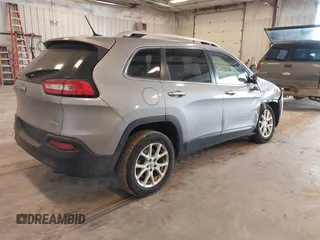 2014 Jeep Cherokee Latitude with VIN 1C4PJLCS1EW106004, listed as a IAAI auction lot 41786457 with 145,588 mi miles. Bid and sale history available at carsss.com. Image 4.